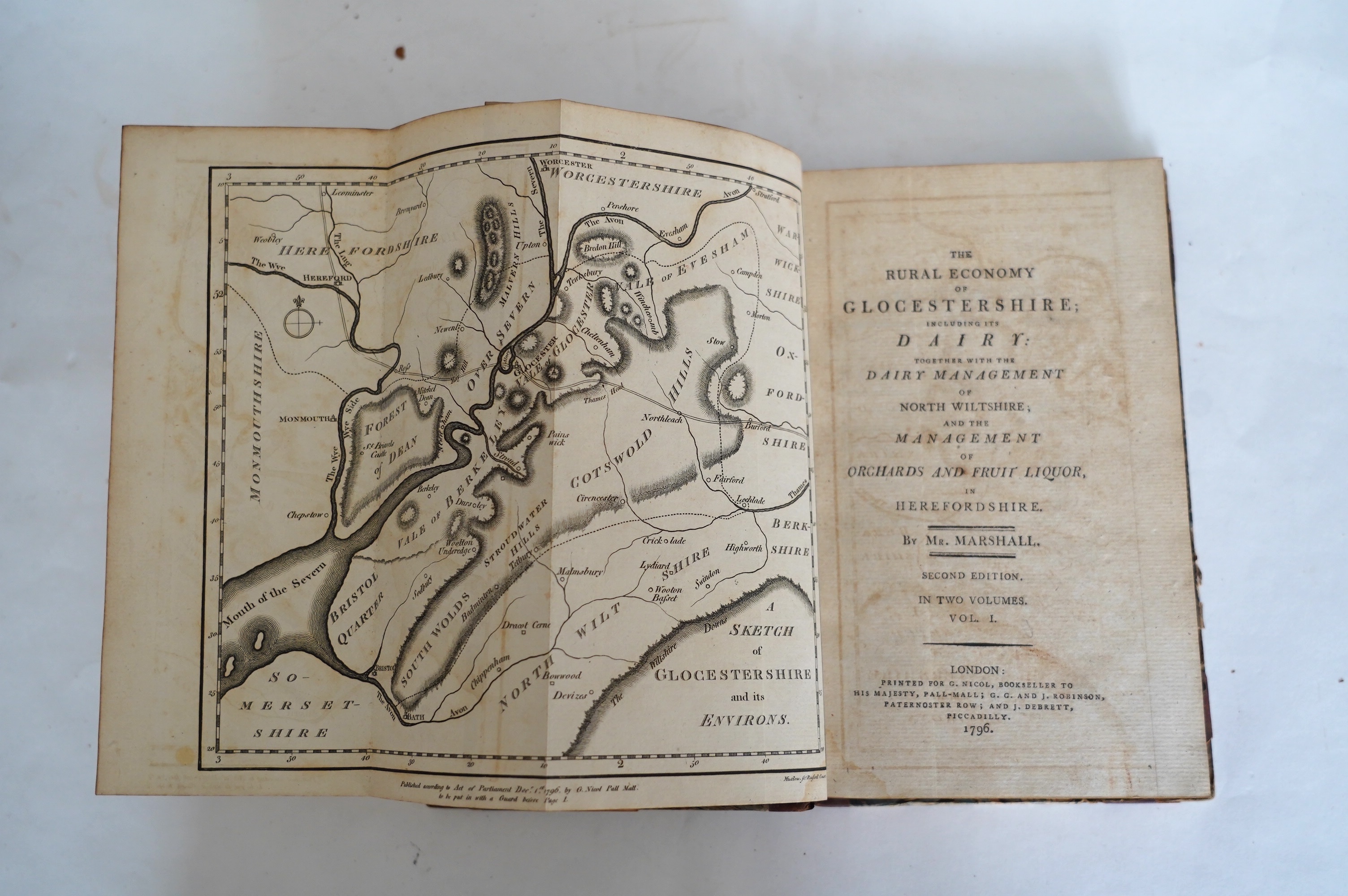 Marshall, William - The Rural Economy of Glocestershire....together with the Dairy Management of North Wiltshire, and ....Orchards and Fruit Liquor, in Herefordshire....2nd edition, 2 vols. folded map; contemp. half calf